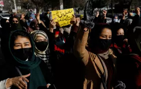 The Taliban's decision to ban Afghan women from working in NGOs came days after the Islamic Emirate ordered universities to stop classes for women. Here, women chant slogans in the capital, Kabul, in protest at the university closure, on 22 December 2022.